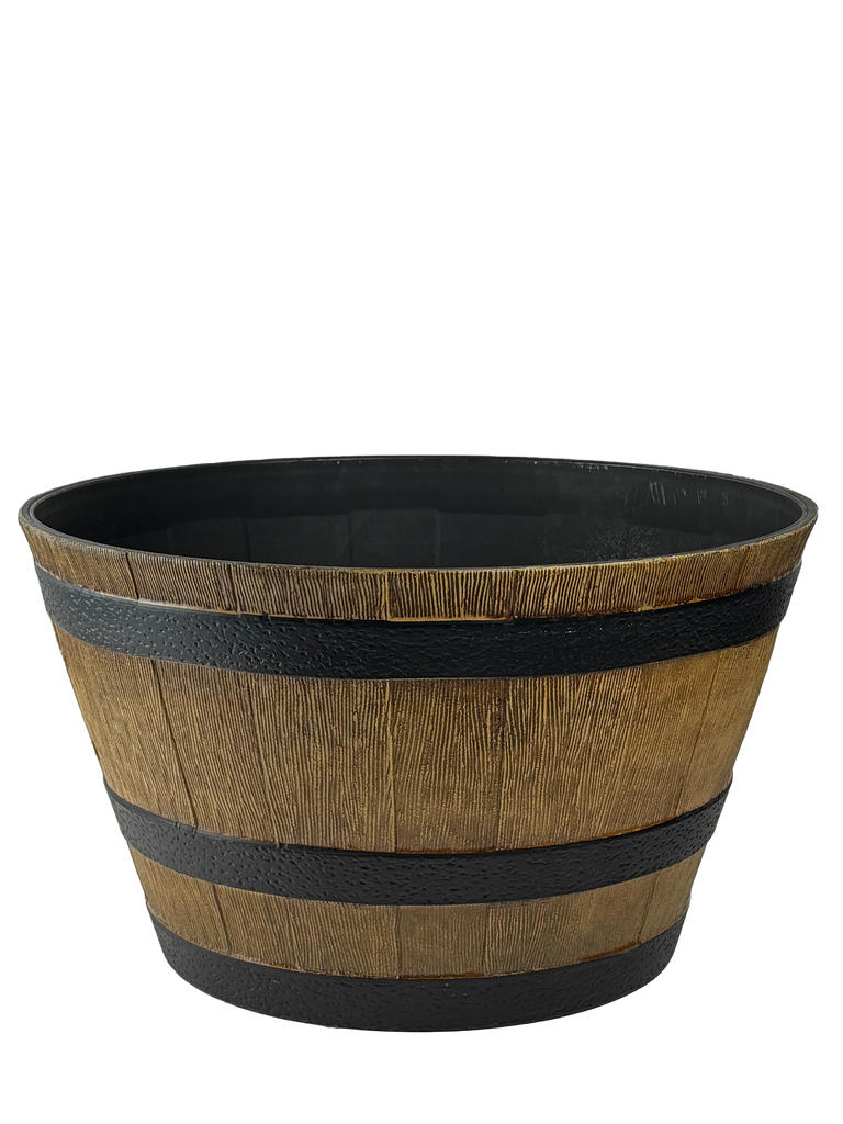 High-angle view of a weather-resistant planter with a realistic wood finish, designed in a classic barrel shape. Its lightweight, recycled plastic construction mimics natural wood for a rustic yet modern appeal.